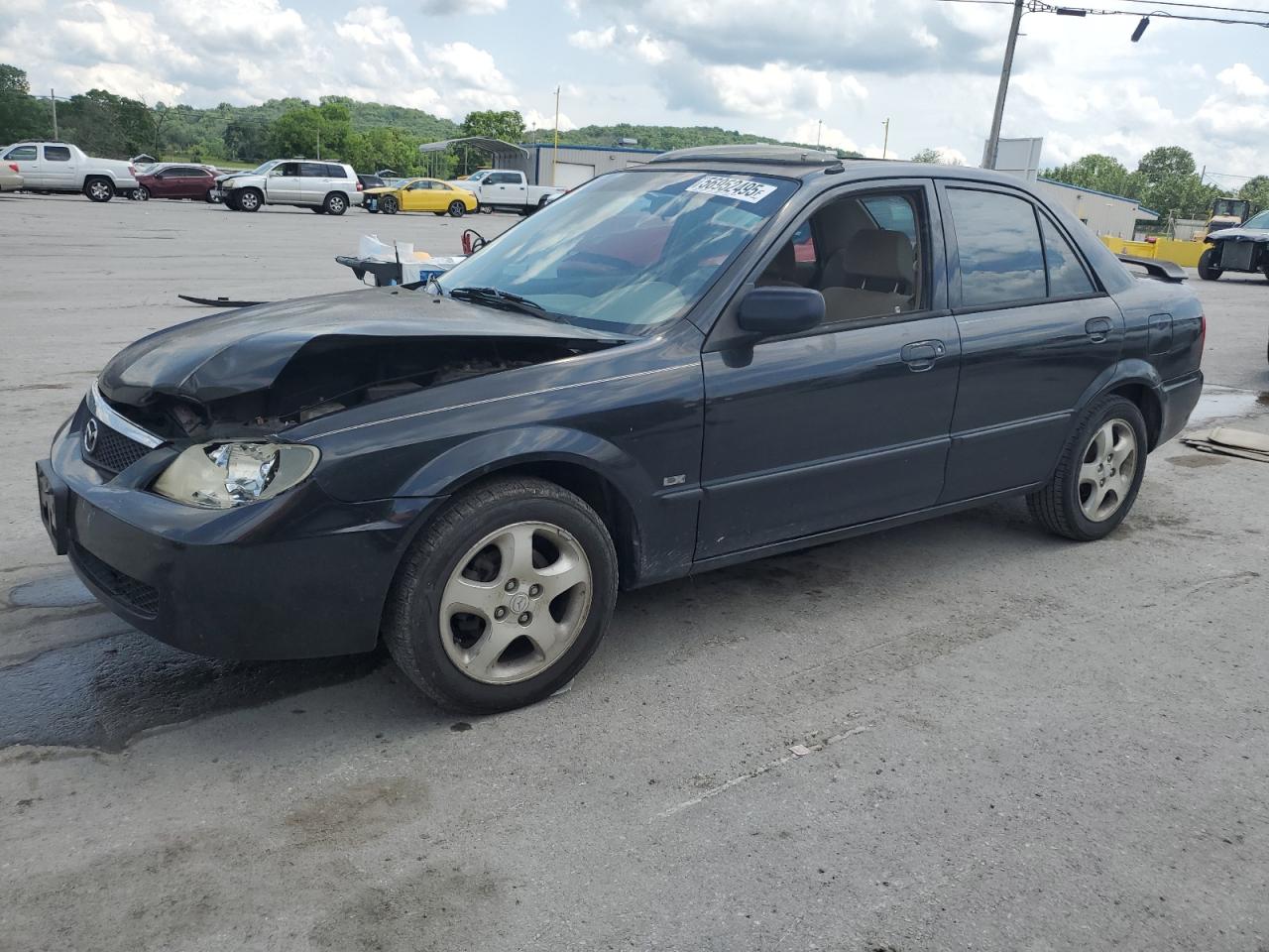 2002 Mazda Protege Dx للبيع في Lebanon، TN - Front End