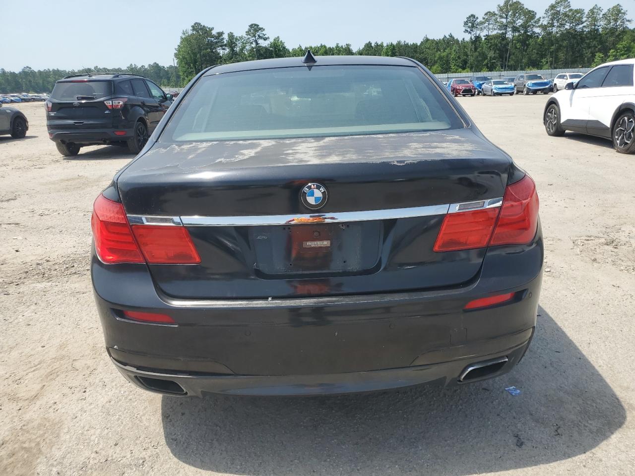 2012 BMW 750 Lxi VIN: WBAKC8C51CC437396 Lot: 57177205