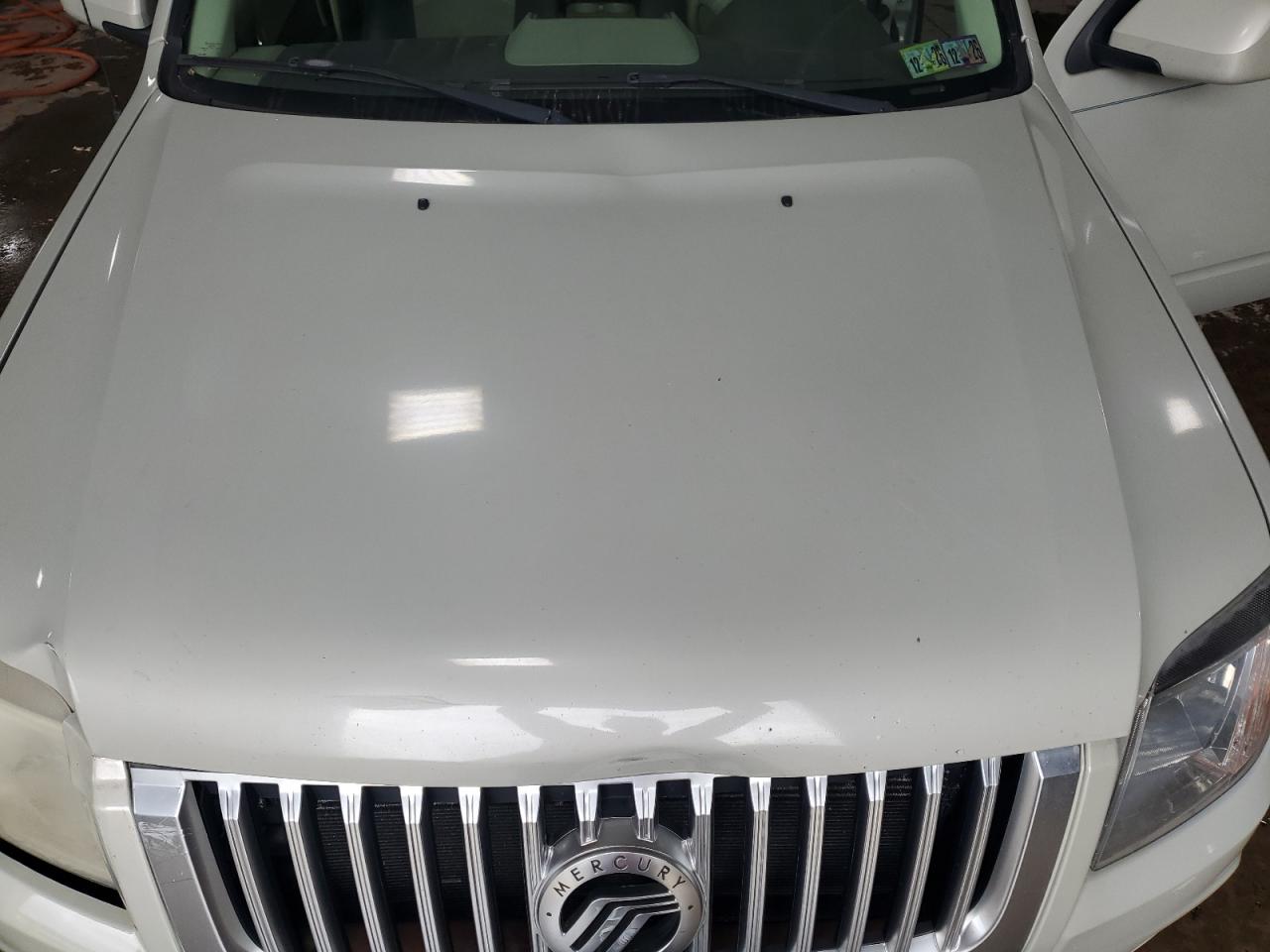 2009 Mercury Mariner Premier VIN: 4M2CU97G59KJ20381 Lot: 56682175