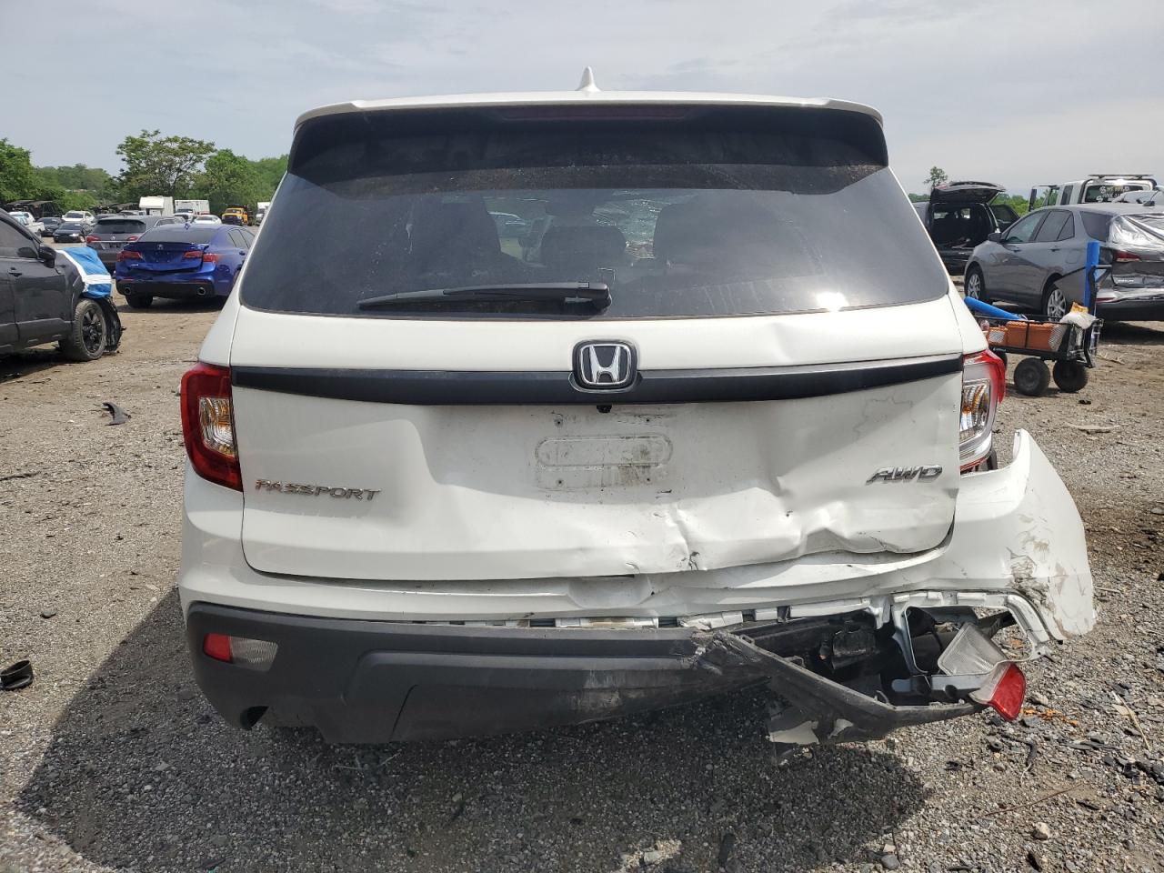 2021 Honda Passport Exl VIN: 5FNYF8H54MB041738 Lot: 56596025