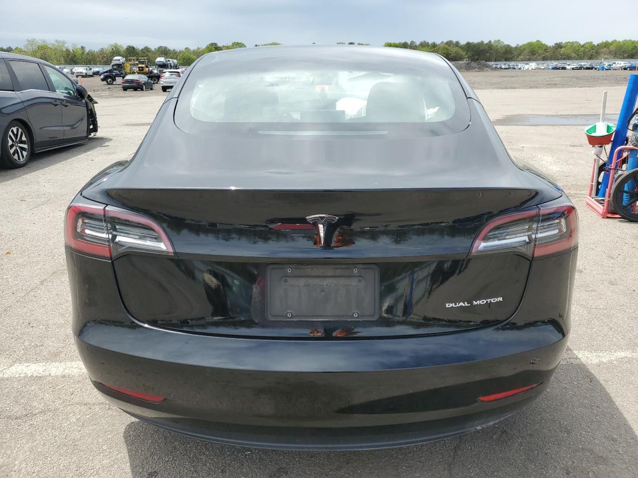 2021 Tesla Model 3 VIN: 5YJ3E1EBXMF855519 Lot: 56676055