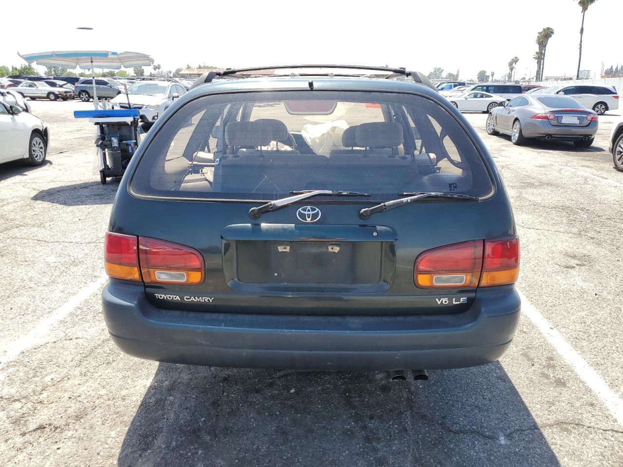 1995 Toyota Camry Le VIN: 4T1GK12W0SU095134 Lot: 57260095