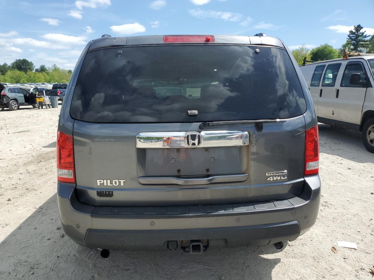 2011 Honda Pilot Touring VIN: 5FNYF4H91BB104027 Lot: 56286595