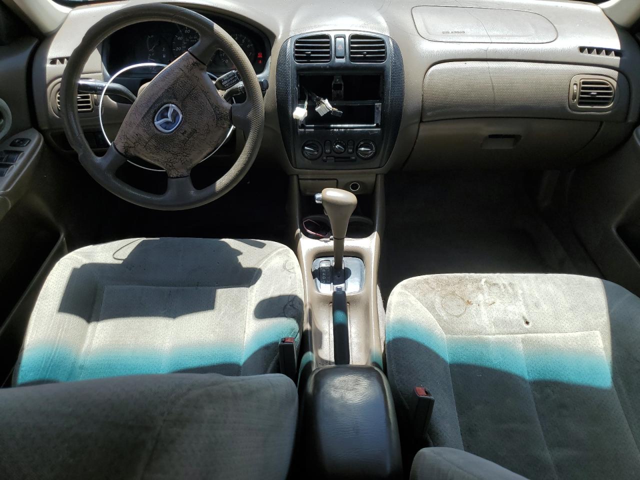 2000 Mazda Protege Dx VIN: JM1BJ222XY0275662 Lot: 57160195