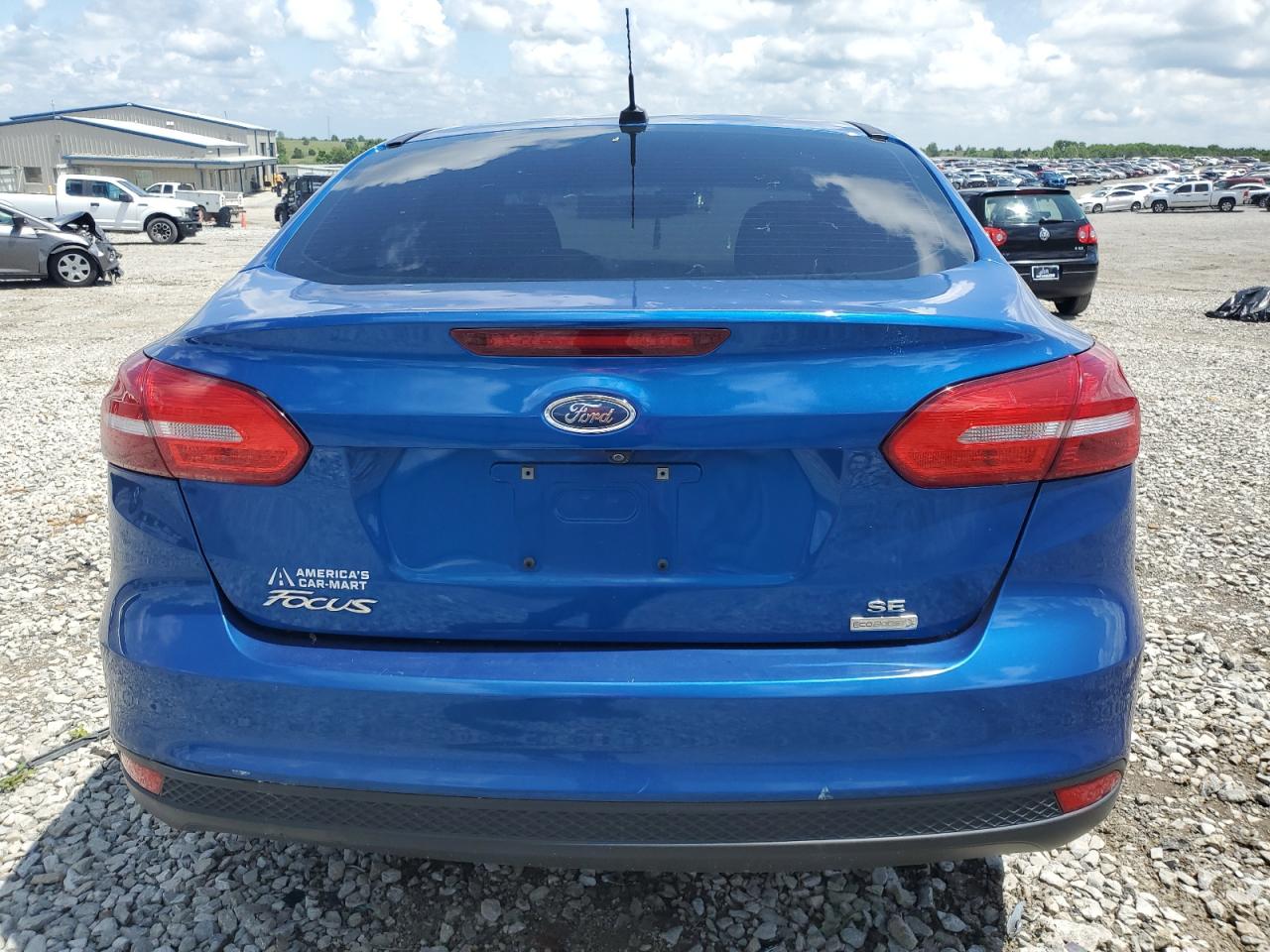 2018 Ford Focus Se VIN: 1FADP3FE2JL293021 Lot: 56907095
