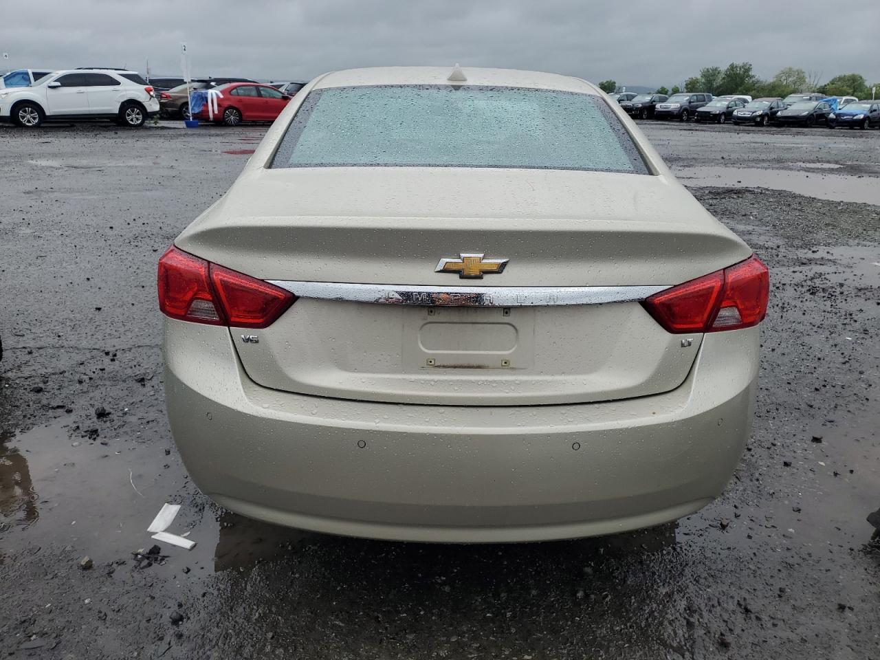 2014 Chevrolet Impala Lt VIN: 2G1125S31E9300428 Lot: 56867865