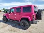 2013 Jeep Wrangler Unlimited Sahara for Sale in Oklahoma City, OK - Side
