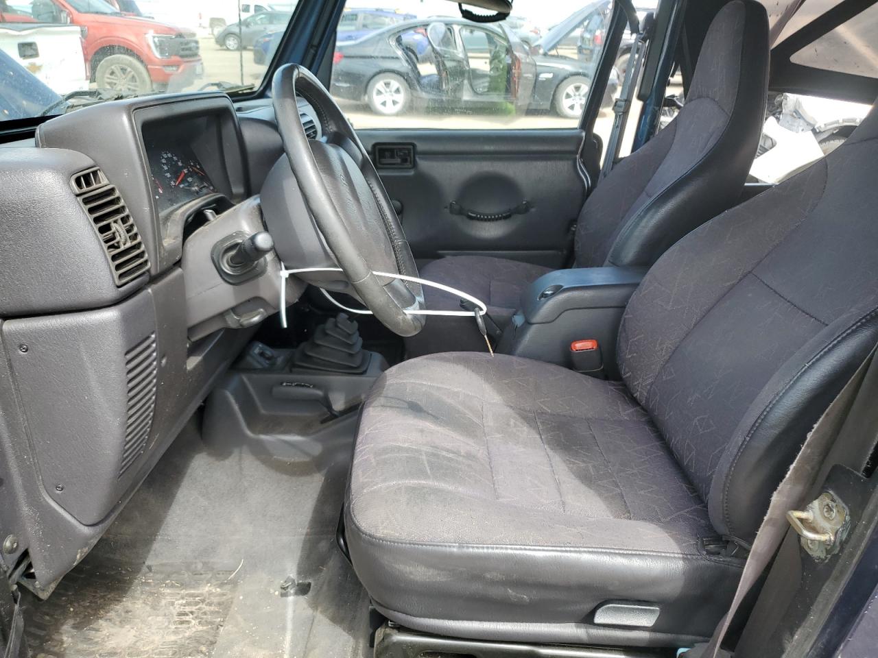 2002 Jeep Wrangler / Tj Sport VIN: 1J4FA49SX2P772609 Lot: 55893425