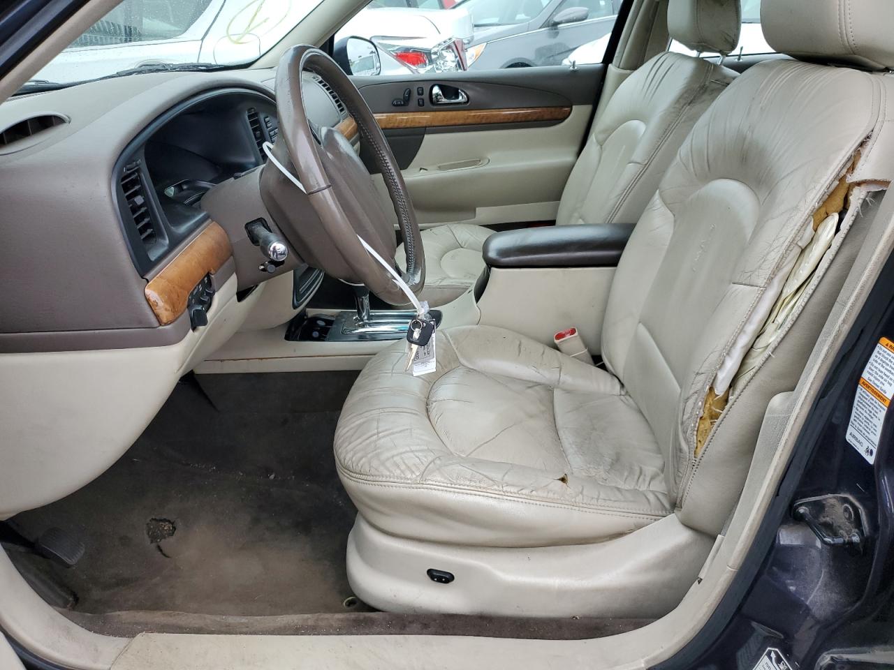 1999 Lincoln Continental VIN: 1LNHM97V2XY676602 Lot: 55109355