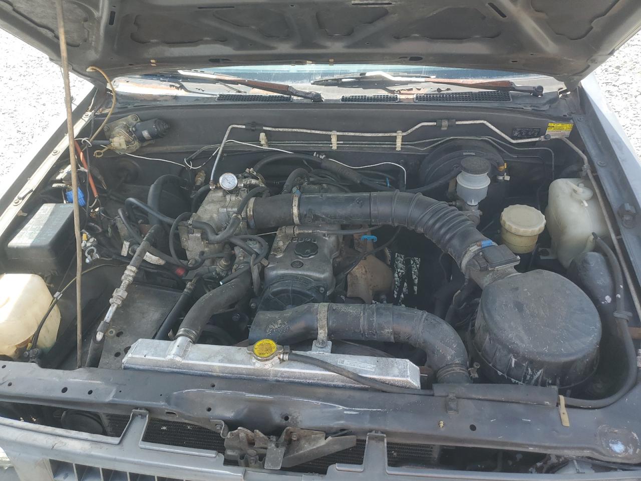 1993 Isuzu Conventional Short Bed VIN: JAACL11E7P7209863 Lot: 56330565