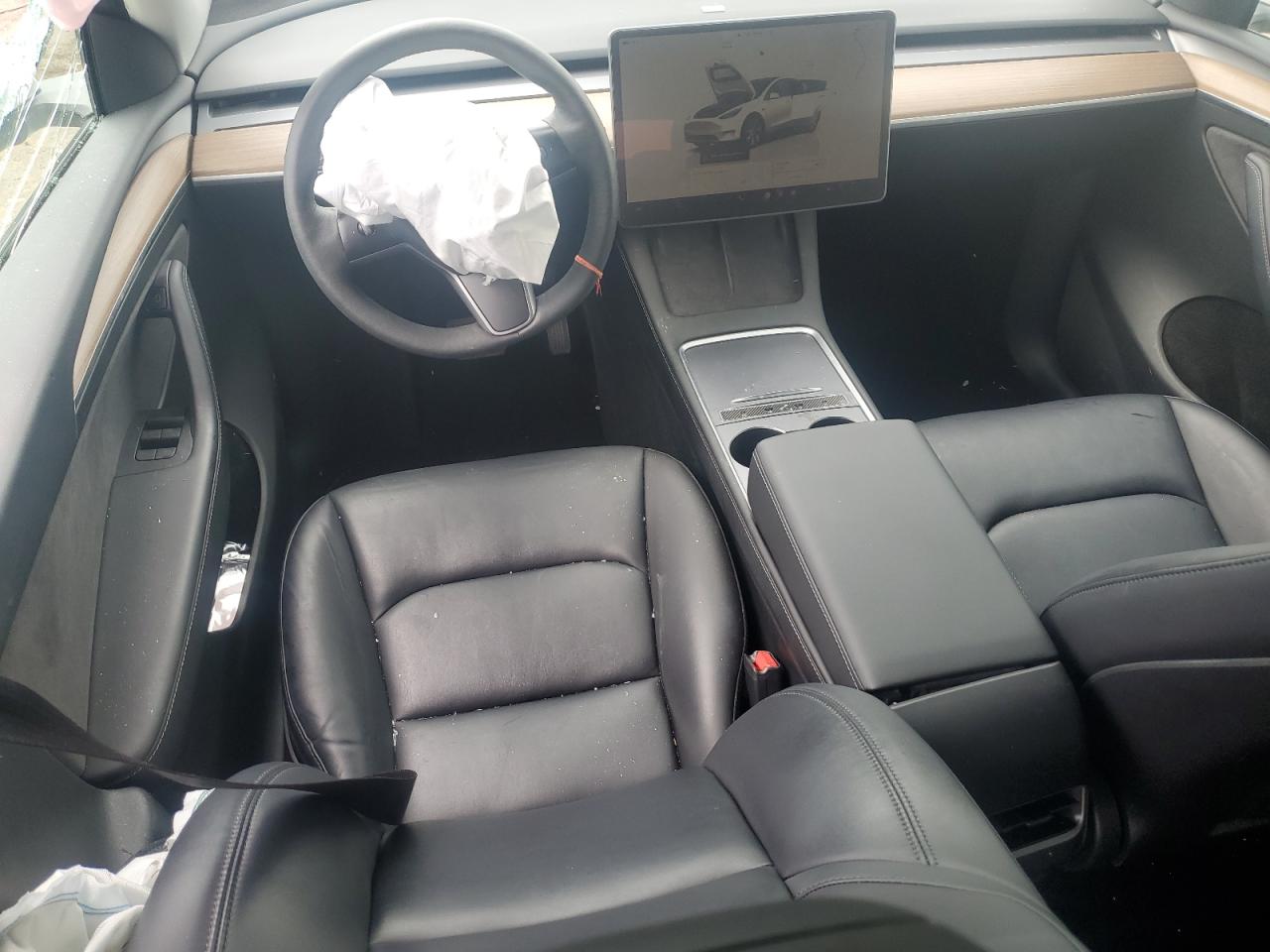 2023 Tesla Model Y VIN: 7SAYGDEE7PF661825 Lot: 57185965