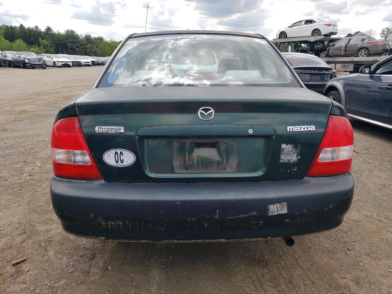 2000 Mazda Protege Dx VIN: JM1BJ2229Y0214674 Lot: 56354685