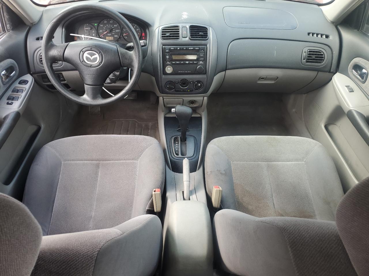2002 Mazda Protege Dx VIN: JM1BJ225521564900 Lot: 56835065