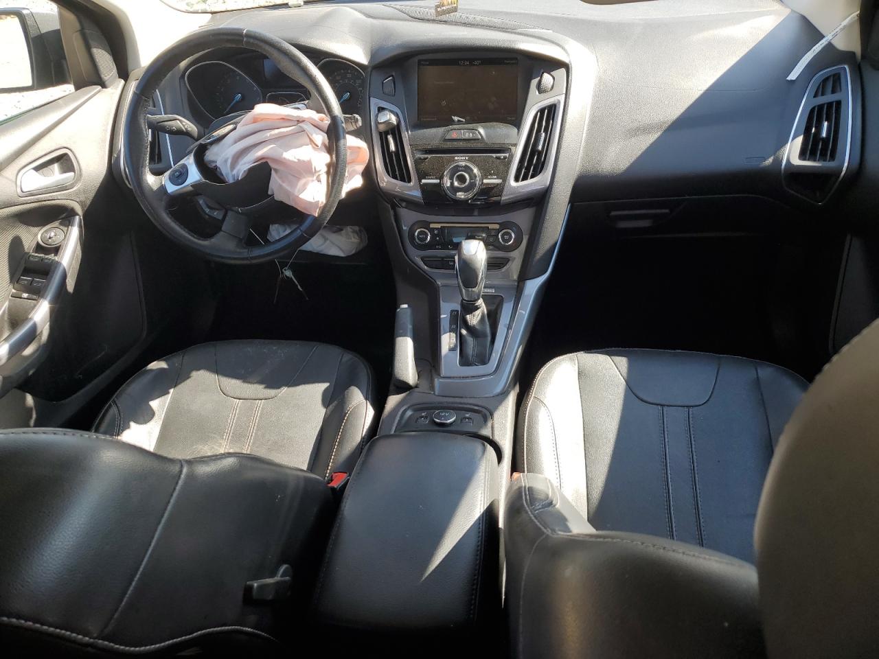 2014 Ford Focus Titanium VIN: 1FADP3N20EL264209 Lot: 57862025