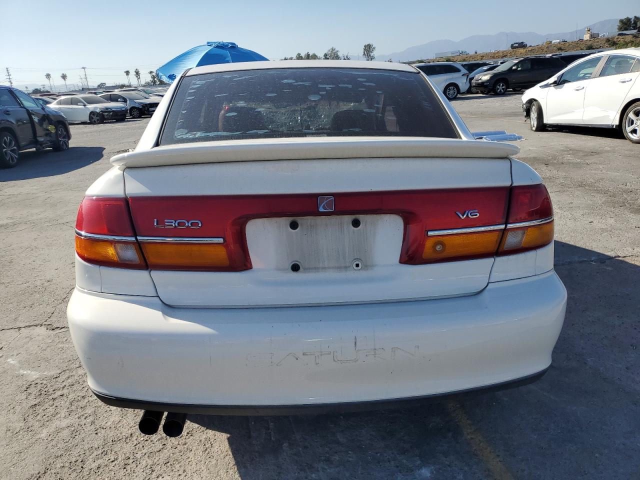 2002 Saturn L300 VIN: 1G8JW54R52Y566288 Lot: 56321595