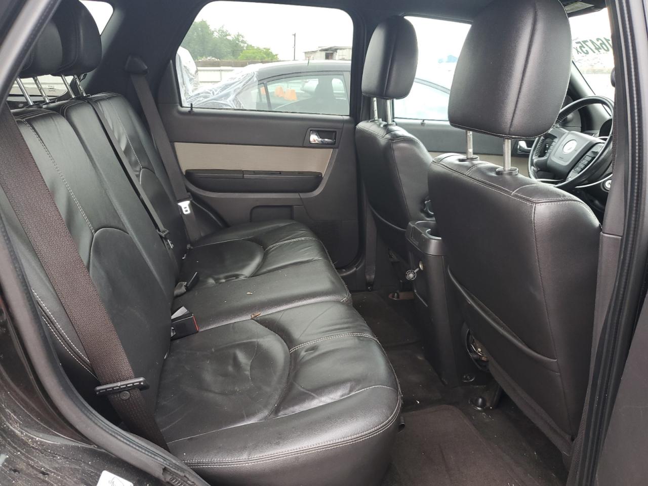 2011 Mercury Mariner Premier VIN: 4M2CN9HG1BKJ00209 Lot: 57016475