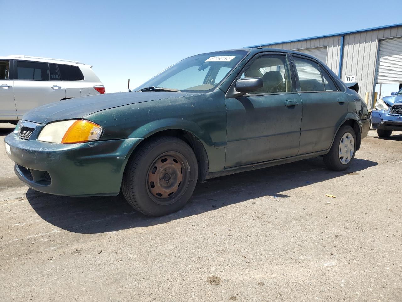 2000 Mazda Protege Dx zu verkaufen in Albuquerque, NM - Rear End