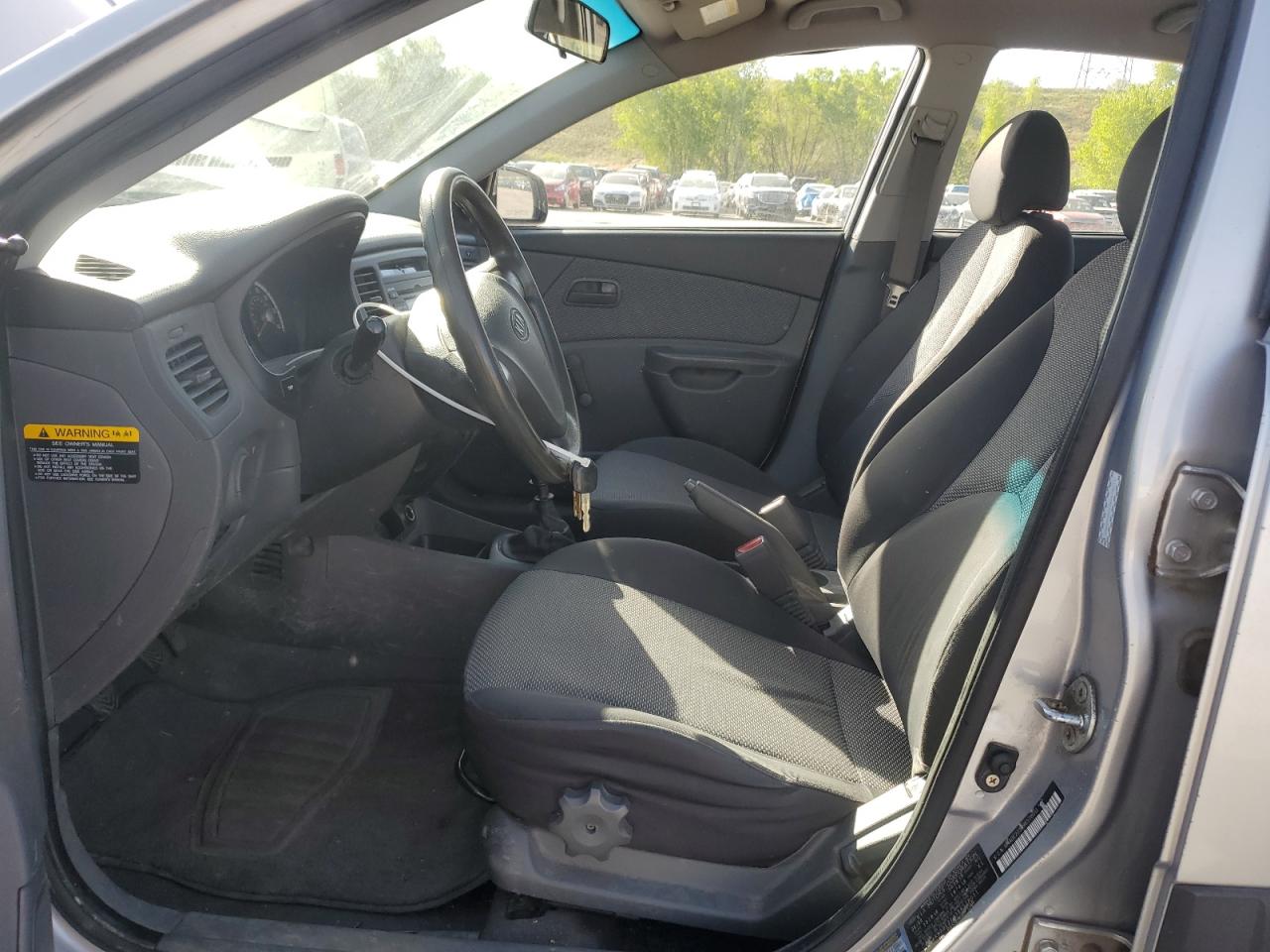 2009 Kia Rio Base VIN: KNADE223396578011 Lot: 56980575