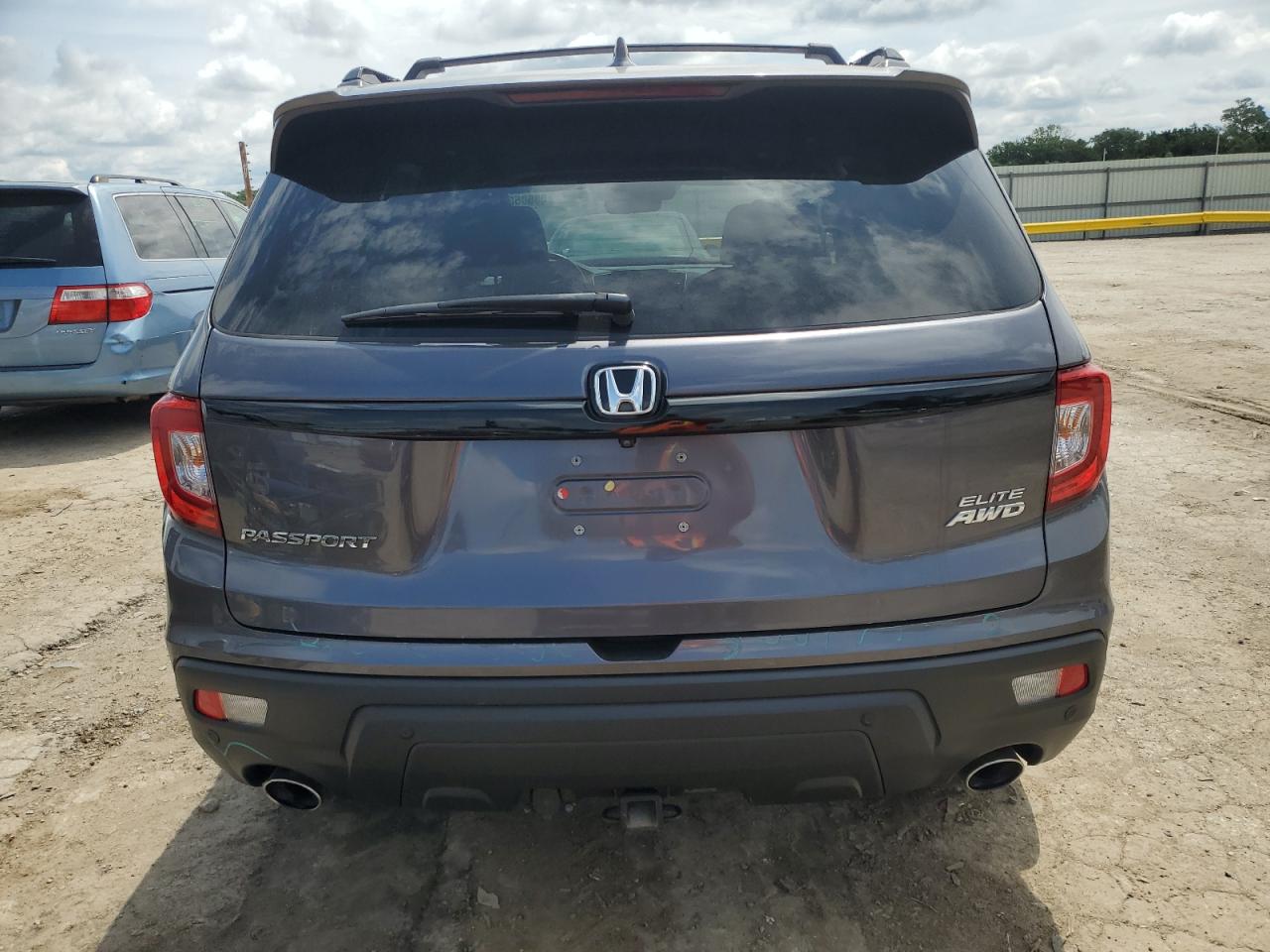 2019 Honda Passport Elite VIN: 5FNYF8H01KB005894 Lot: 58585835