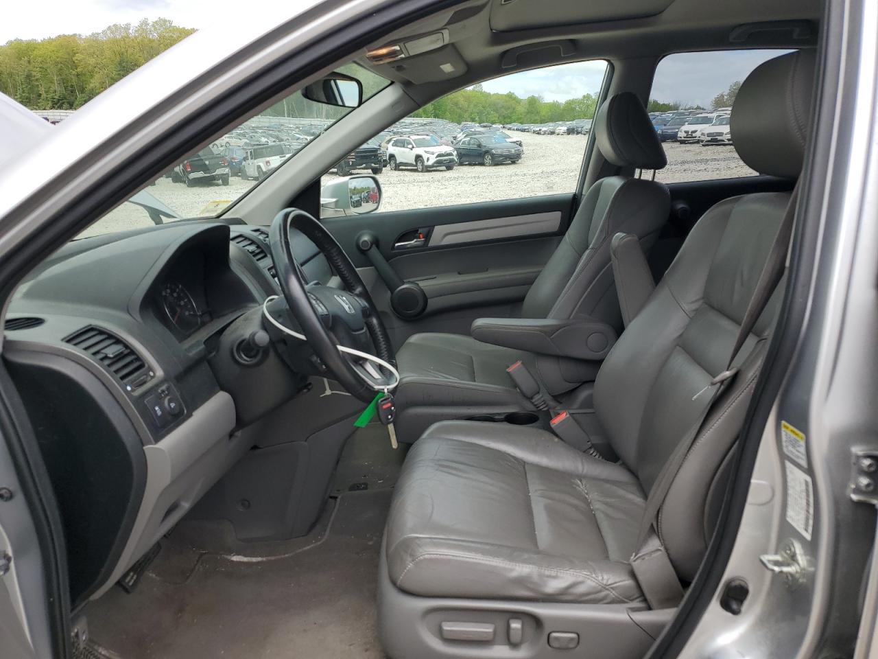 2010 Honda Cr-V Exl VIN: JHLRE4H7XAC004674 Lot: 56661425