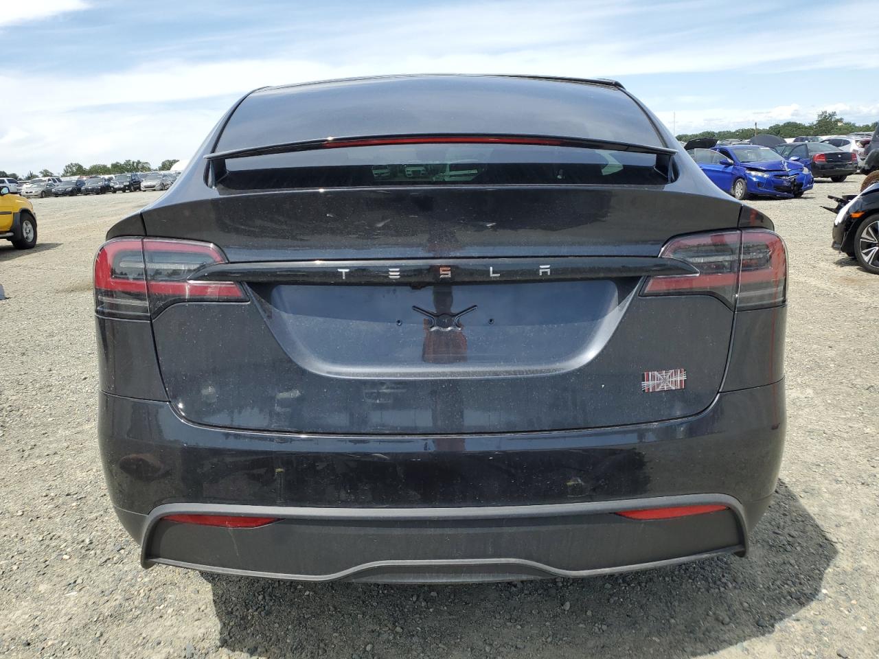 2024 Tesla Model X VIN: 7SAXCBE69RF454070 Lot: 56875585