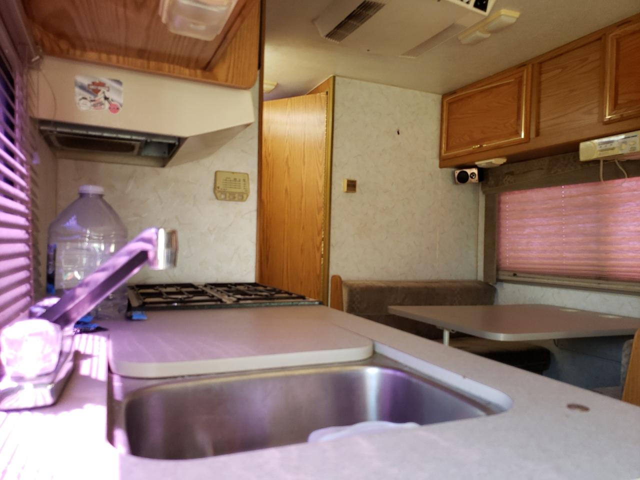 1997 Ford Econoline E450 Super Duty Cutaway Van Rv VIN: 1FDLE40S4VHA75490 Lot: 55633885