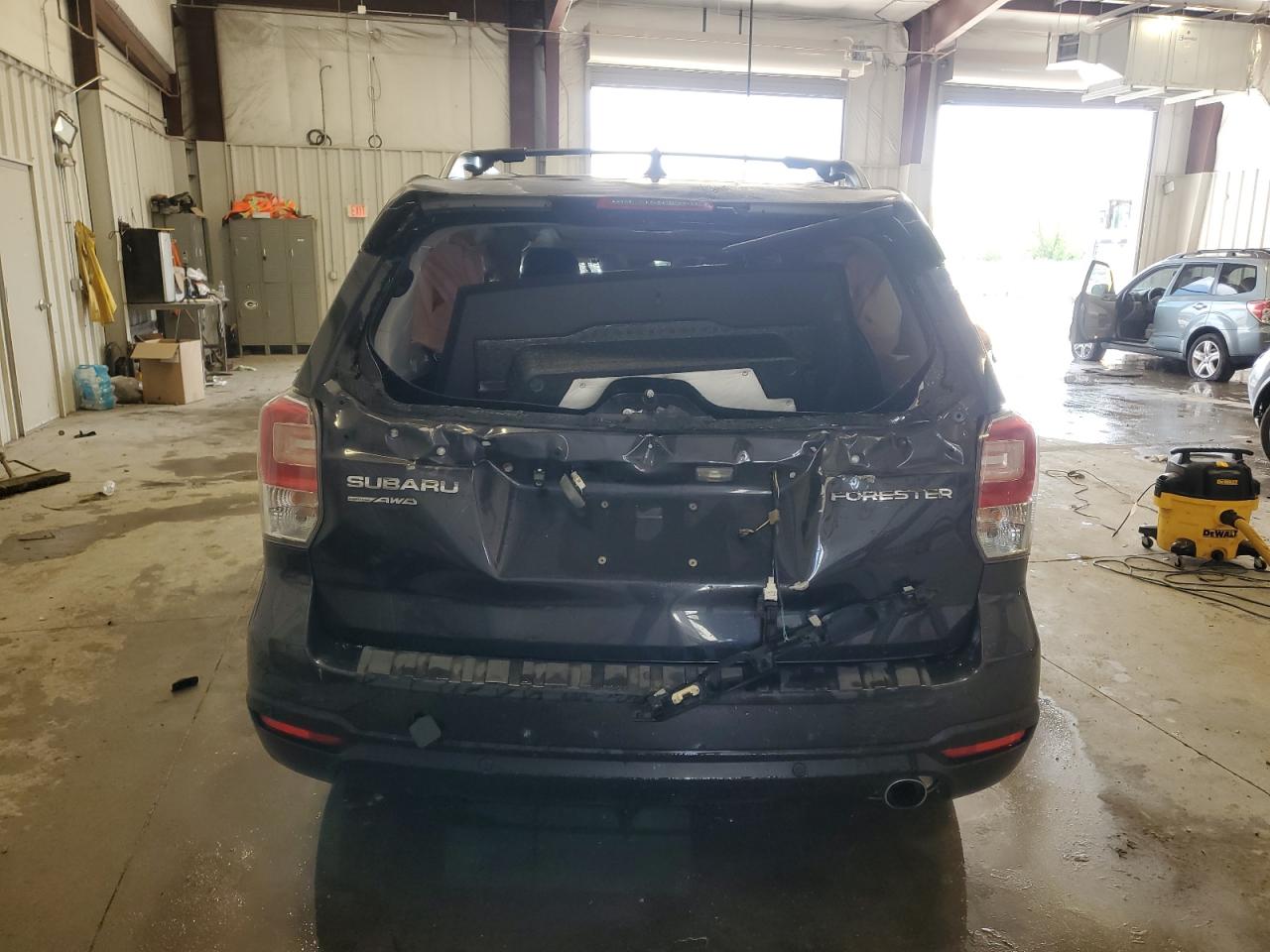 2018 Subaru Forester 2.5I Touring VIN: JF2SJAWC5JH490825 Lot: 58514905