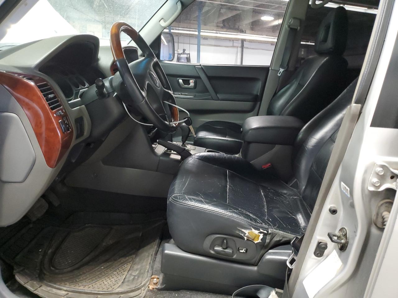 2003 Mitsubishi Montero Limited VIN: JA4NW51S33J036825 Lot: 57118005