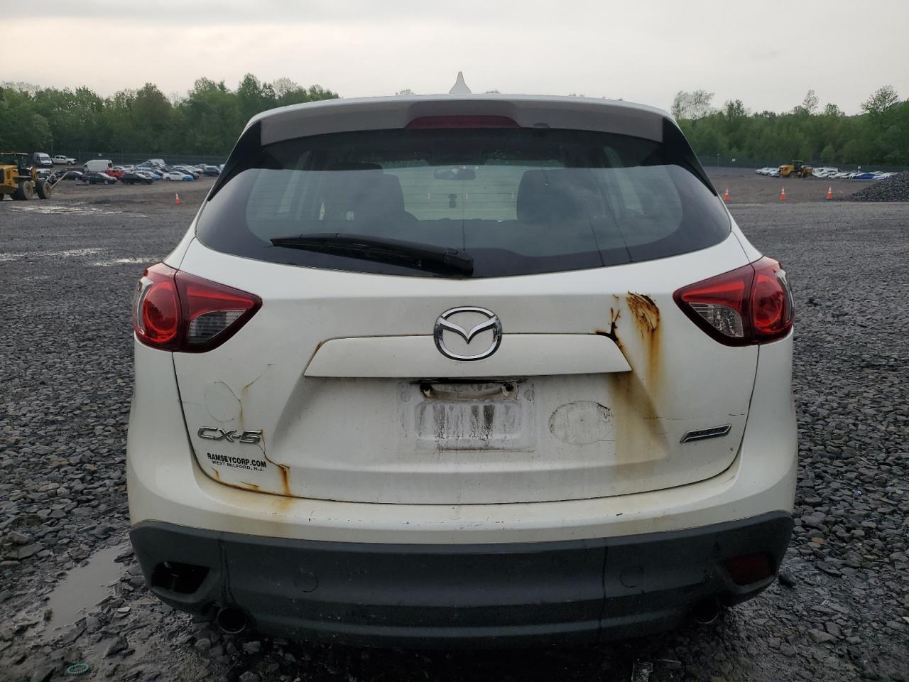 2016 Mazda Cx-5 Sport VIN: JM3KE4BY4G0899953 Lot: 57269035