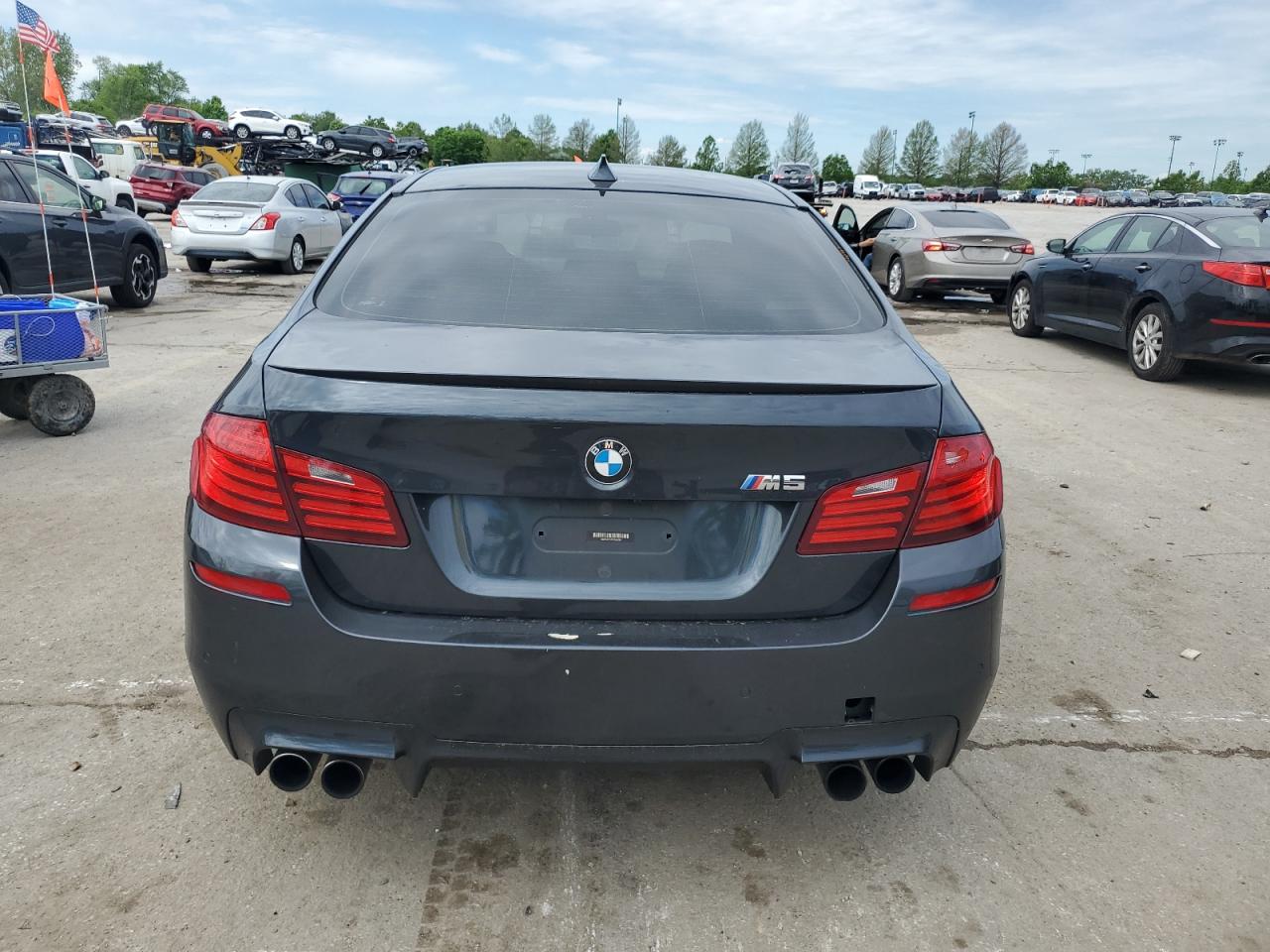 2015 BMW M5 VIN: WBSFV9C52FD594284 Lot: 55893555