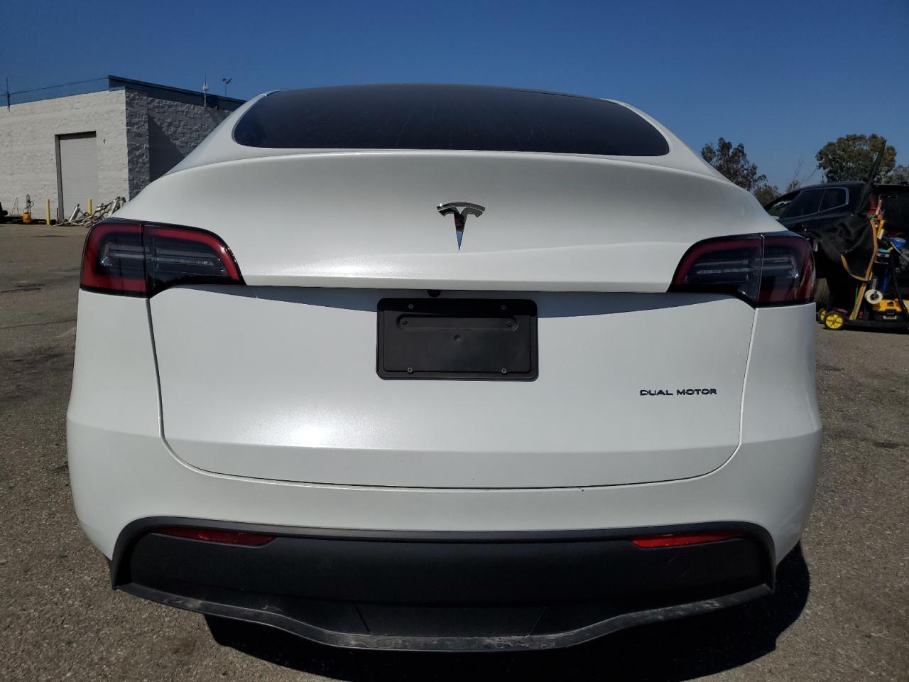 2023 Tesla Model Y VIN: 7SAYGDEE8PA094621 Lot: 56987365