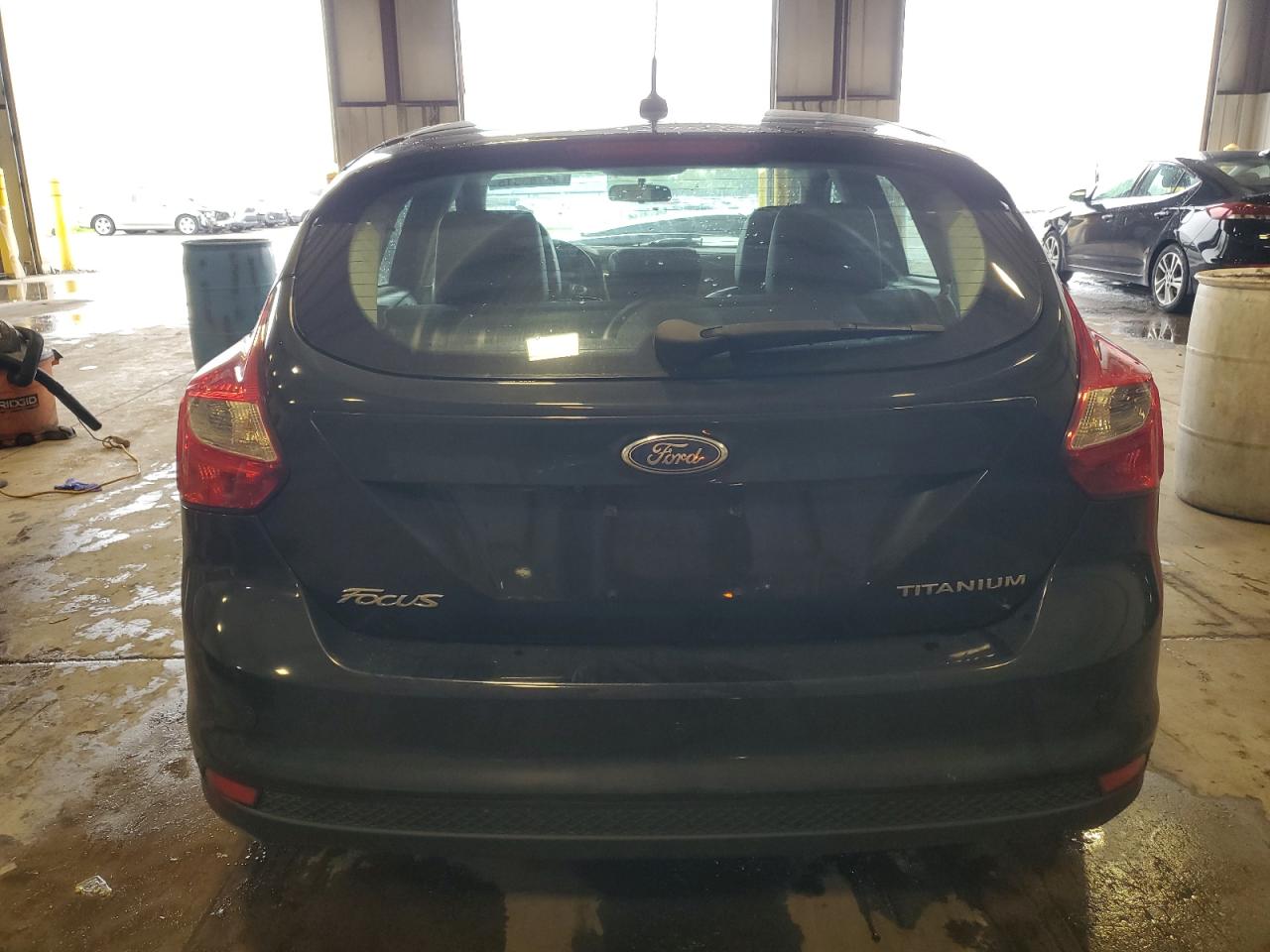 2014 Ford Focus Titanium VIN: 1FADP3N20EL457251 Lot: 56785315