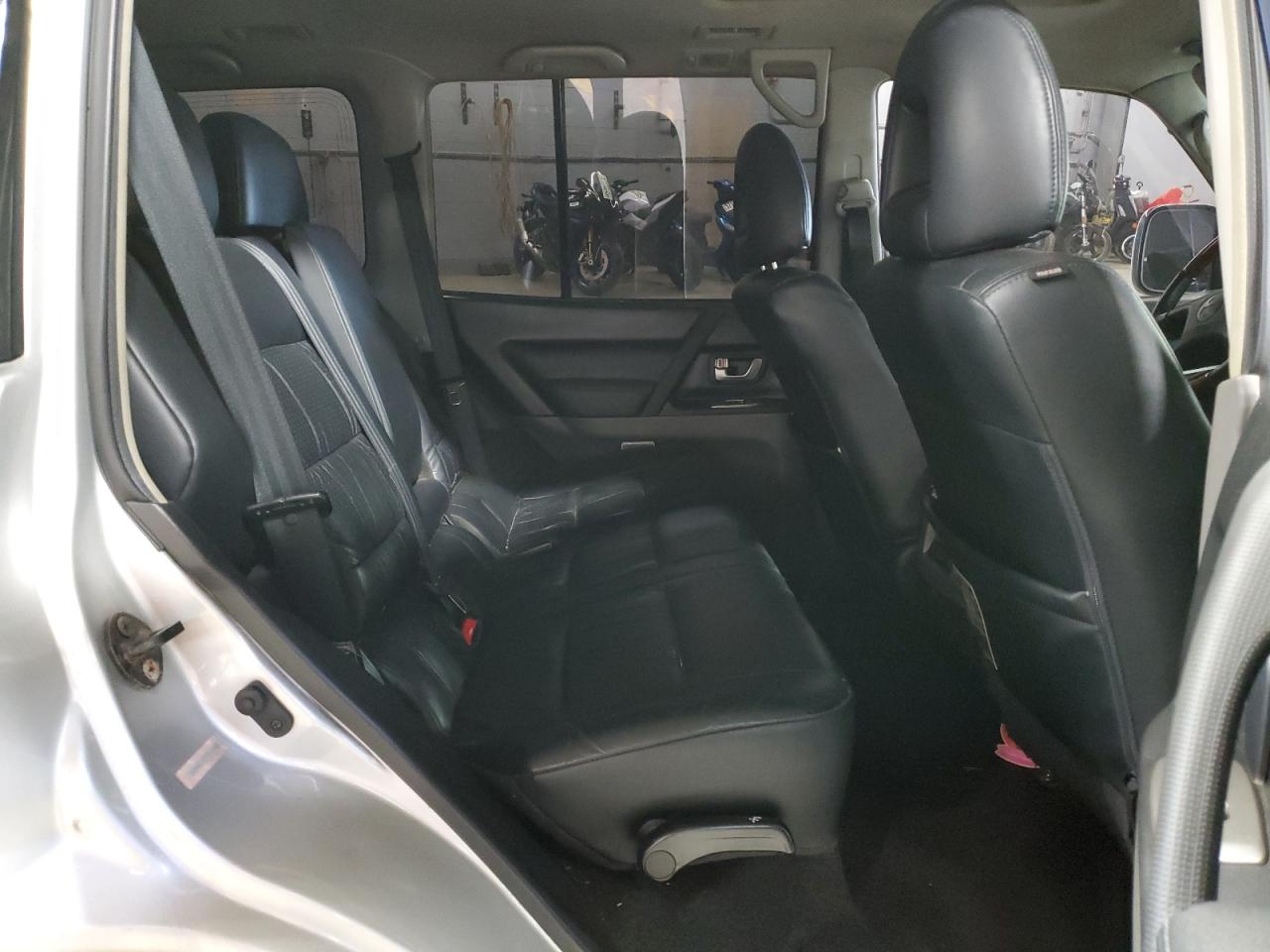 2003 Mitsubishi Montero Limited VIN: JA4NW51S33J036825 Lot: 57118005