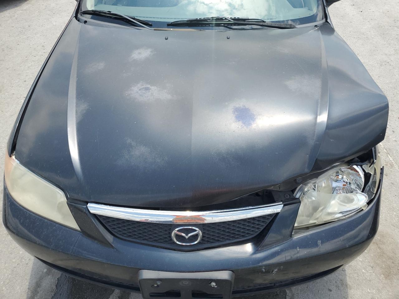 2002 Mazda Protege Dx VIN: JM1BJ225020537013 Lot: 56952495