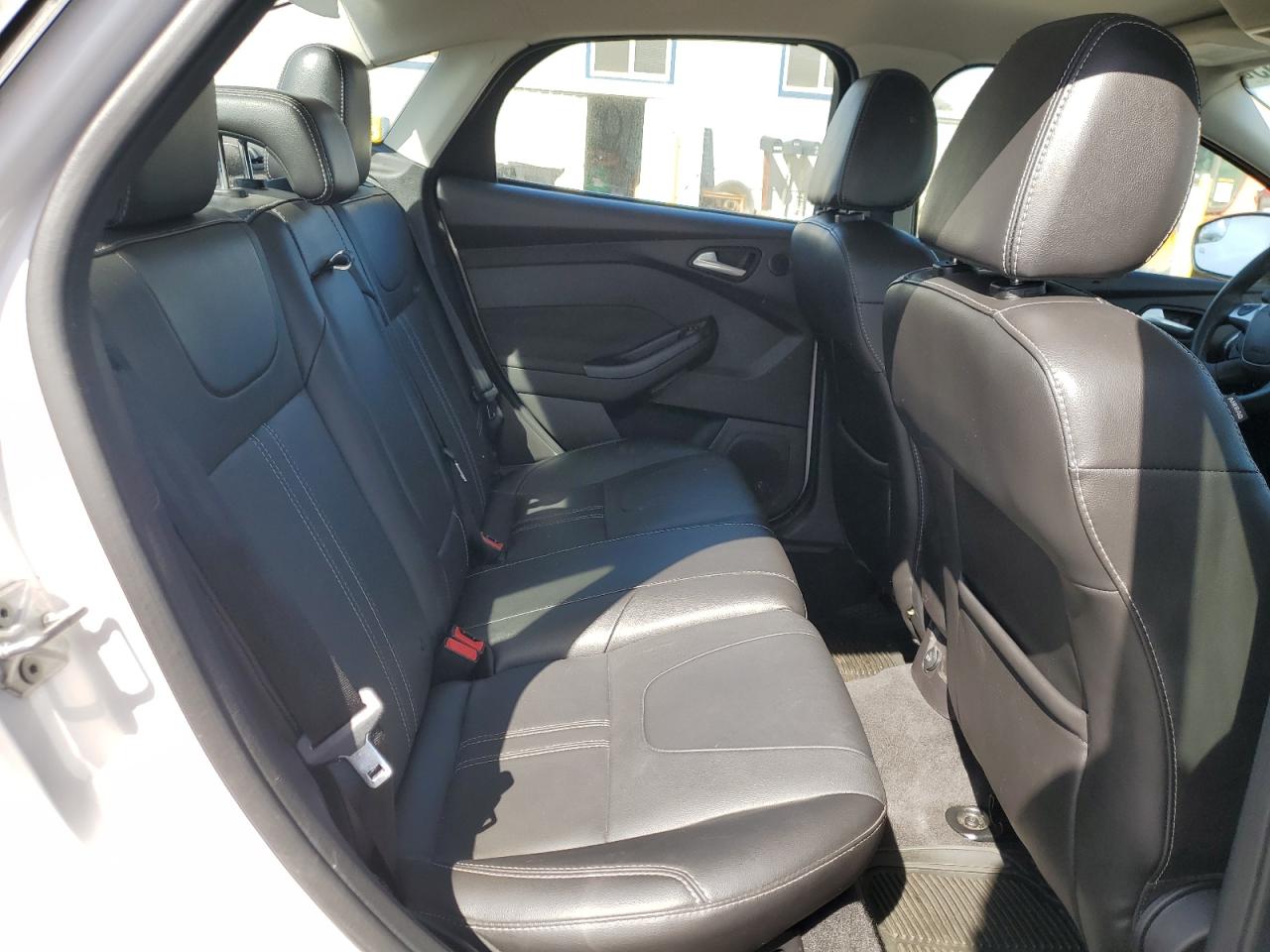 2014 Ford Focus Titanium VIN: 1FADP3J20EL199447 Lot: 54268465