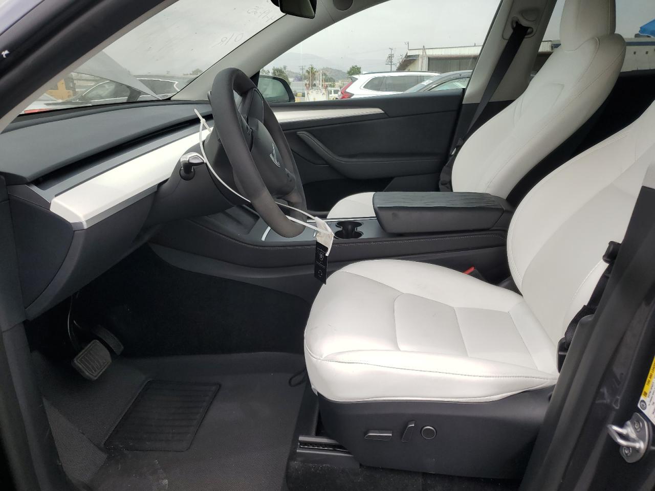 2023 Tesla Model Y VIN: 7SAYGDEE3PF898280 Lot: 56758725