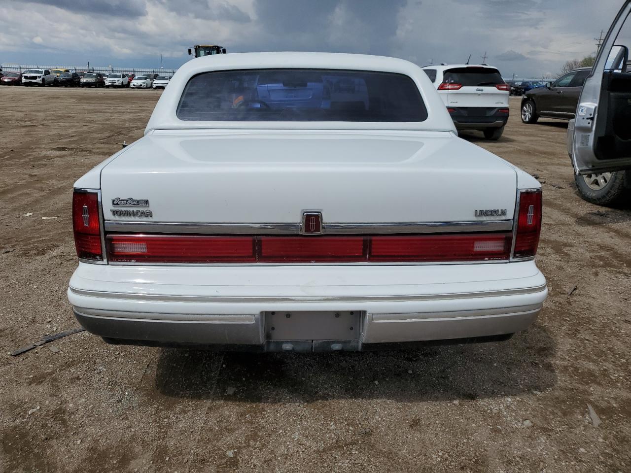 1991 Lincoln Town Car Signature VIN: 1LNCM82W9MY688004 Lot: 54927145