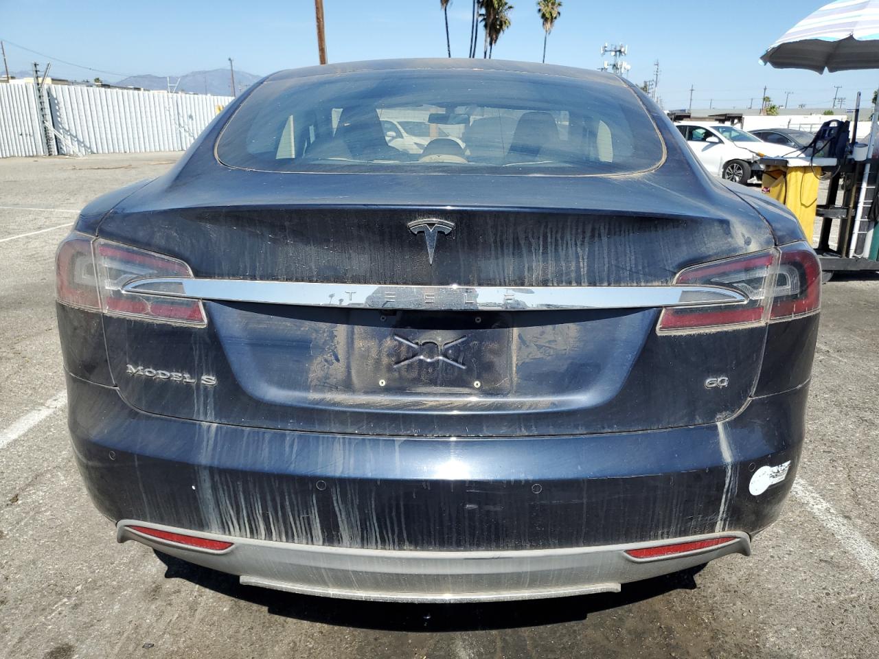 2014 Tesla Model S VIN: 5YJSA1S16EFP32322 Lot: 57327215