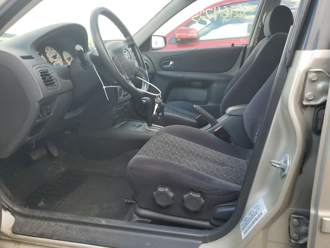 2001 Mazda Protege Lx VIN: JM1BJ225710433794 Lot: 52164725