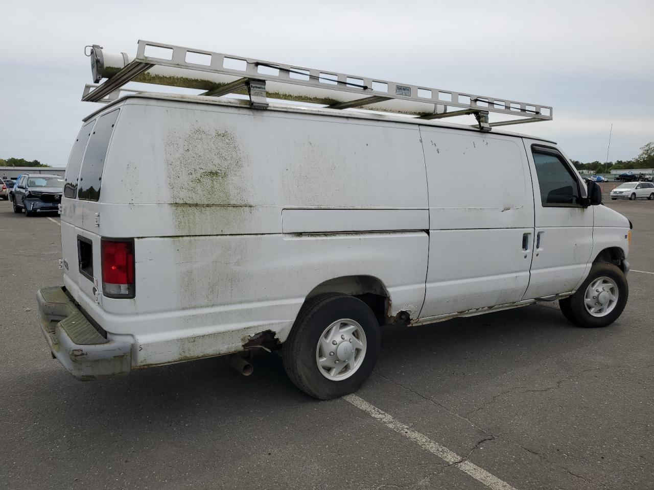 1999 Ford Econoline E350 Super Duty Van white null gas 1FTSS34L1XHB37355 photo #4