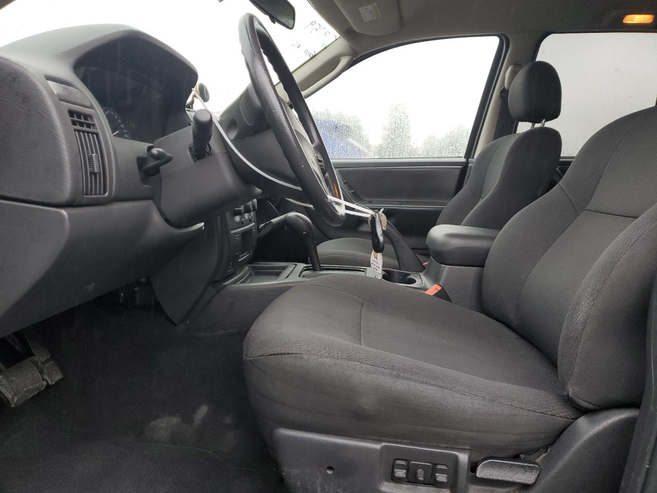2004 Jeep Grand Cherokee Laredo VIN: 1J4GX48S54C163149 Lot: 56875305