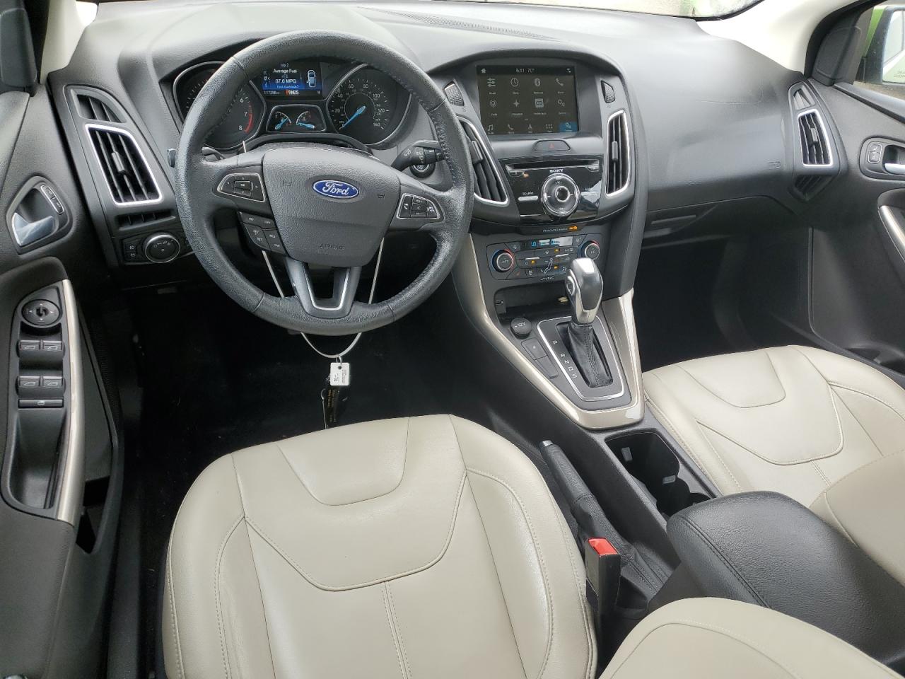 2018 Ford Focus Titanium VIN: 1FADP3J24JL314044 Lot: 57130285
