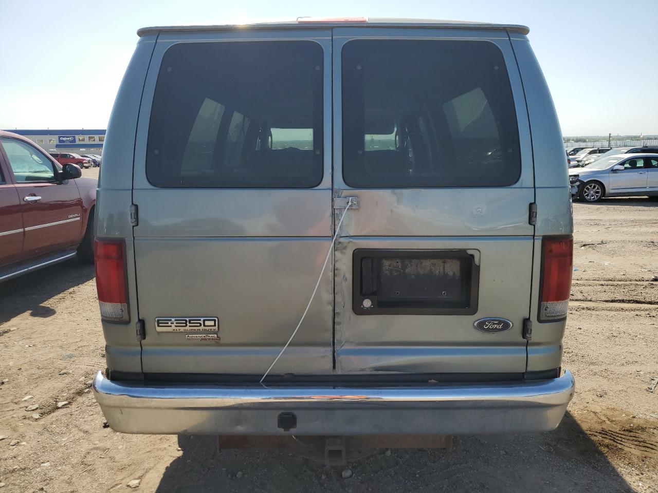 2006 Ford Econoline E350 Super Duty Wagon VIN: 1FBSS31L06DA87417 Lot: 51070765