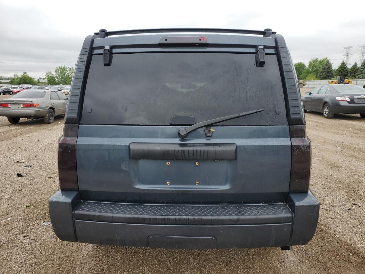 2007 Jeep Commander VIN: 1J8HG48P27C635598 Lot: 57289285