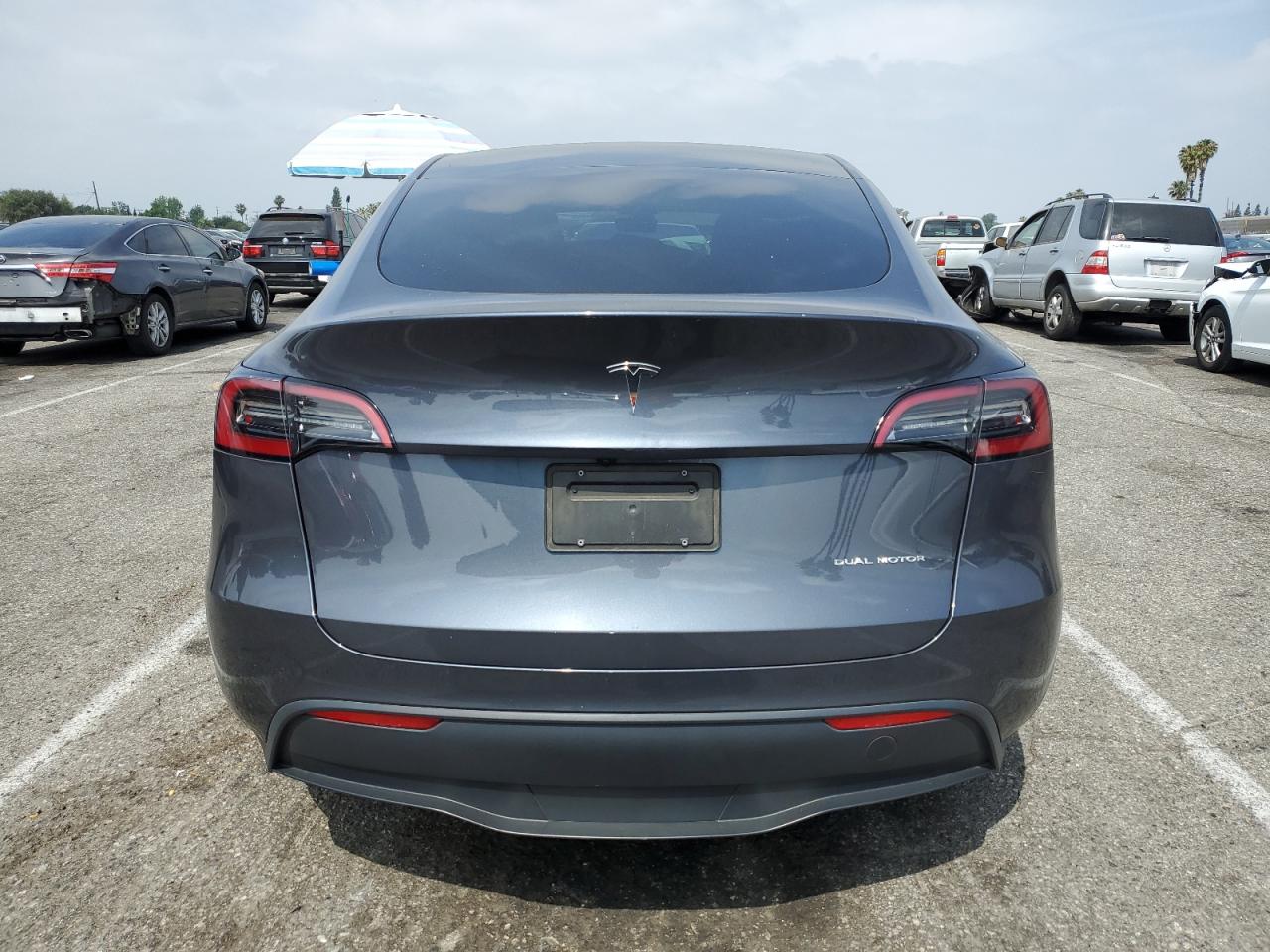 2023 Tesla Model Y VIN: 7SAYGDEE0PA153077 Lot: 58527055