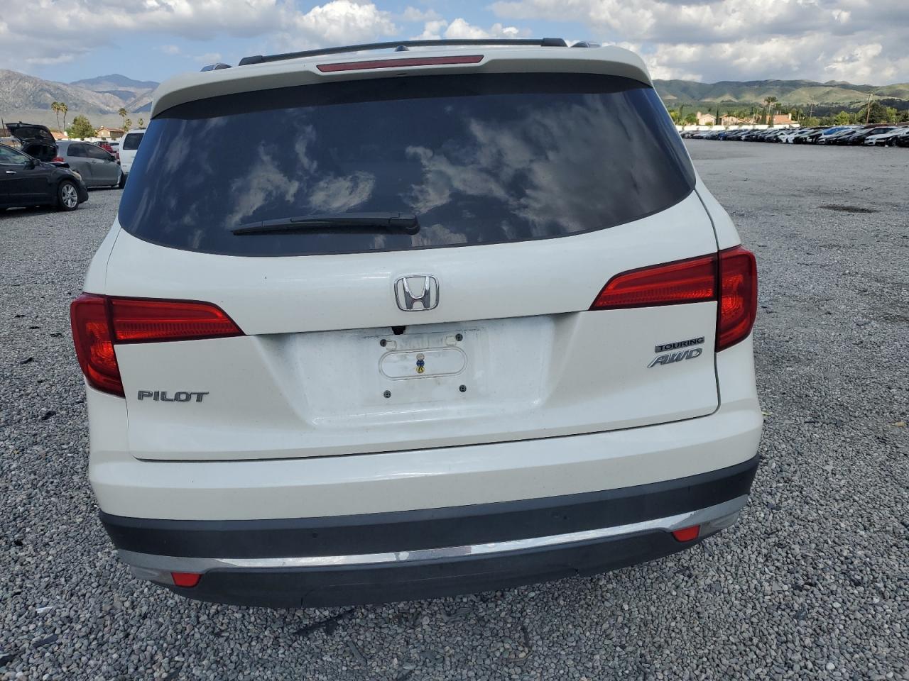 2016 Honda Pilot Touring VIN: 5FNYF6H98GB099878 Lot: 56819955