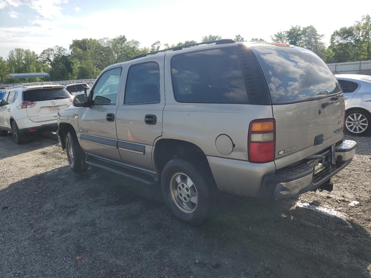 2003 Chevrolet Tahoe C1500 VIN: 1GNEC13ZX3R250768 Lot: 56576895