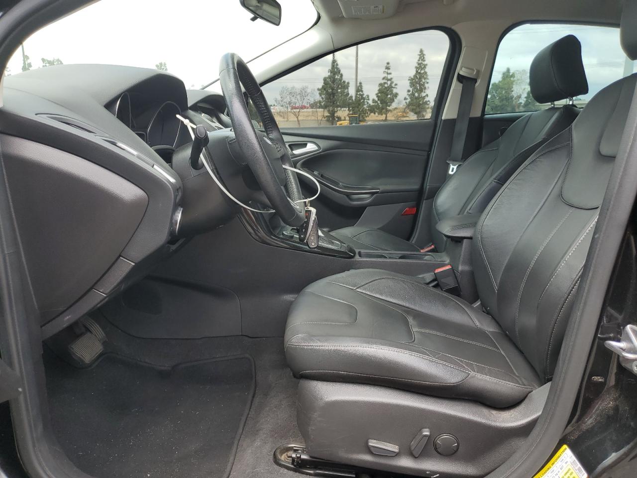 2015 Ford Focus Titanium VIN: 1FADP3N20FL232314 Lot: 56893515