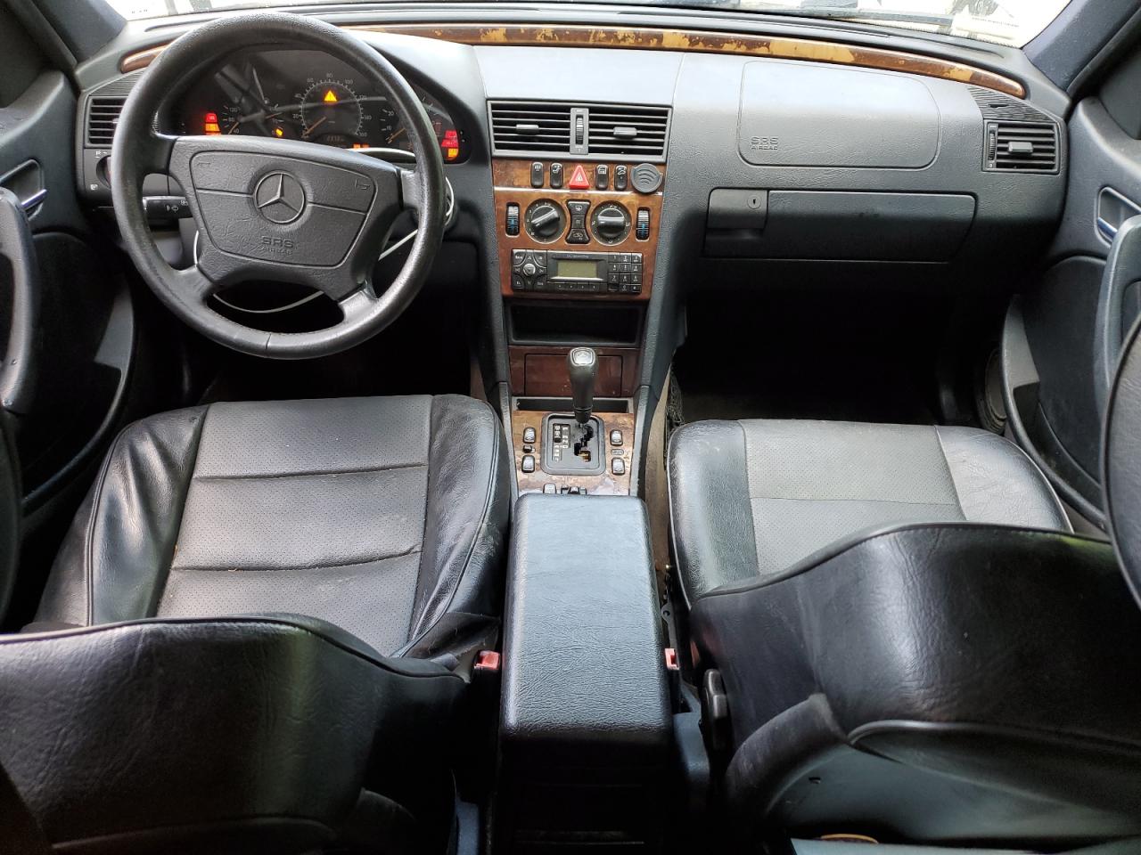 1999 Mercedes-Benz C 230 VIN: WDBHA24G4XA749633 Lot: 56560105