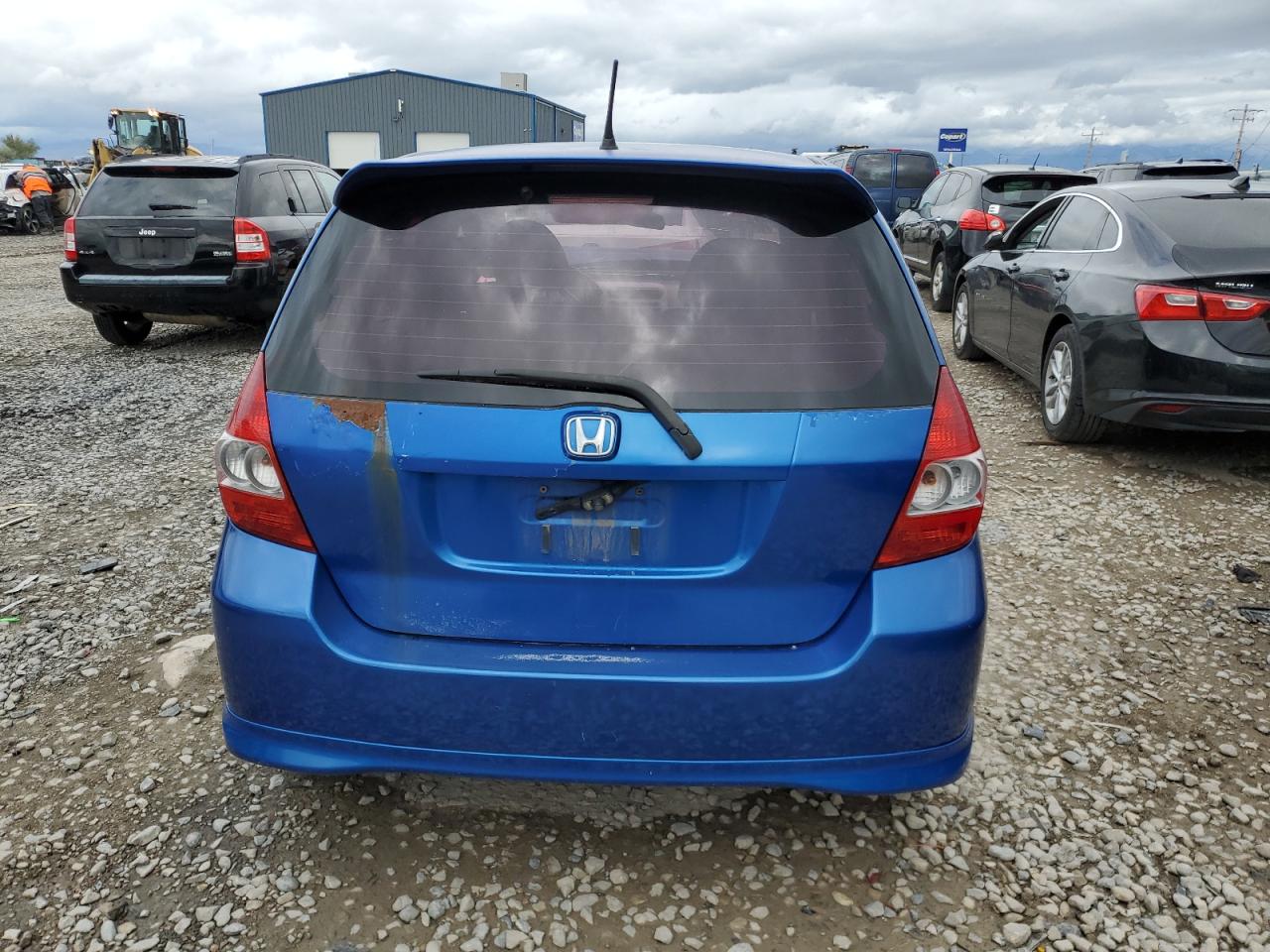 2007 Honda Fit S VIN: JHMGD38637S021256 Lot: 57242895